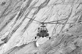 This shot taken from a helicopter shows a Mi-17 1V negotiating the harsh terrain after departing from base camp on a mission to forward posts in Siachen.