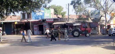 Shops at Kup Chowk, near Mandi Ahmedgarh, which will have to be razed to widen the Ludhiana-Malerkotla road