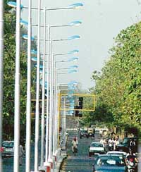 Illuminated street lights on the road dividing Sector 15 and Panjab University during daytime speak contrary to claims of power saving measures of the Chandigarh Administration
