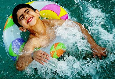 A child makes a splash in the Panjab University swimming pool