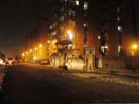 A road leading to Housefed flats being recarpeted for the visit of the Chief Minister, Capt Amarinder Singh, in Ludhiana