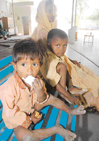 Raj Kumar's wife and two sons.