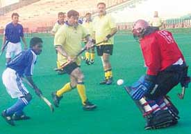 Nikhil aims to strike on the opening day of the Ninth St Stephens Carrom Ranking Tournament held at St Stephens School, Sector 45, Chandigarh, on Wednesday.