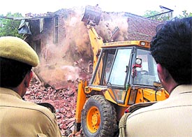 An unauthorised building being demolished by the MCD at Jamia Millia in the Capital