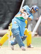 Suresh Raina in action during a warm-up match between India and Jamaica in Montego Bay 