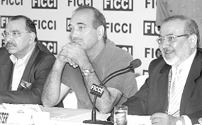 Jammu and Kashmir Chief Minister Ghulam Nabi Azad (centre) at a function organised by the FICCI in Srinagar on Friday.