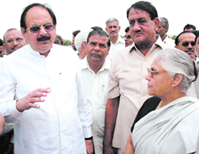 Delhi Chief Minister Sheila Dikshit inspecting the relocation site of the displaced JJ dwellers at Savda Ghevra. Delhi Urban Development and PWD Minister Dr A. K. Walia also accompanied her. 