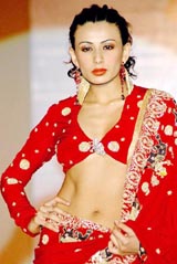 A model displays a collection of the graduates of NIFT
