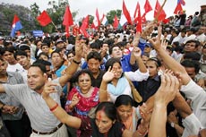 Nepalis dance and celebrate at Ratna Park in Kathmandu