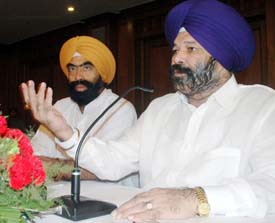 SAD general secretary Omkar Singh Thapar addresses a press conference
