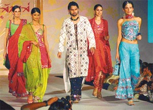 Models showcase a blend of traditional and modern dresses designed by NIIFT students