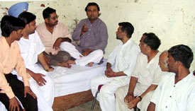 Mr Rajiv Tondon, president, Akhil Bhartya Hindu Samiti, addresses office-bearers of the Samiti in Ahmedgarh on Sunday