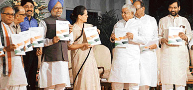 Prime Minister Manmohan Singh, UPA chairperson Sonia Gandhi, Lalu Yadav, Ramvilas Paswan, Sharad Pawar, Dayanidhi Maran, Pranab Mukherjee and other leaders release UPAs report card to mark successful two years of UPA government in New Delhi on Monday