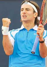 Spains Tommy Robredo celebrates after beating Czech Radek Stepanek in the final of the Hamburg Masters tennis tournament on Sunday. 