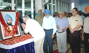 Mr R.P. Bambah, Trustee of The Tribune Trust, pays floral tributes to The Tribune founder, Sardar Dyal Singh Majithia, at a function to mark the 125th anniversary of the newspaper in Chandigarh on Tuesday.