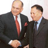Defence Secretary Shekhar Dutt shakes hands with his Pakistani counterpart Lt Gen Tariq Waseem Ghazi prior to the delegation level talks on troop withdrawal from Siachen at South Block in New Delhi on Tuesday