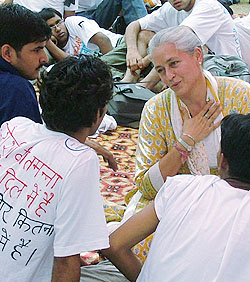 Socialite Nafisa Ali talks with doctors and medical students sitting on fast at AIIMS in New Delhi on Wednesday.