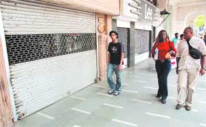 Traders of Connaught Place closed their shops for half a day in support of the medical students strike against reservation in the Capital on Thursday.