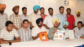 The president of the Students Organisation of India, Mr Parminder Singh Brar, releases the programme of the outfit in Ludhiana on Thursday