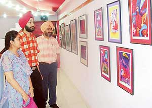 Art lovers having a delightful time at Mohalis first art gallery.