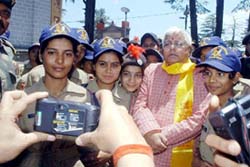 Mr Lalu Prasad Yadav, Railways Minister, with NCC cadets from Punjab at Jakhu Temple in Shimla on Friday.