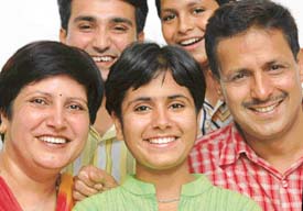 Meenal Gakhar, a student of Bhavan Vidyalaya, Sector 27, flanked by family members after she topped Chandigarh in the CBSE Class X examination in Chandigarh on Saturday. 
