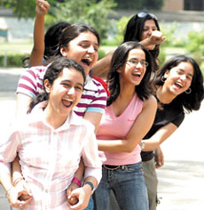 Students exult after declaration of the results. 