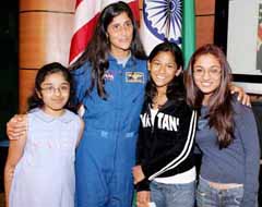 Indian-American astronaut Sunita Williams poses for a picture with Indian-American kids in Ediso