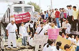 Medical students stop the Jan Shatabdi at the Chandigarh railway station