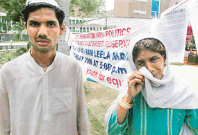 Mother of Nayab Ahmed, a cancer patient from Bijnore in UP, in tears after failing to find the doctor, who was treating her ailing son, at AIIMS in New Delhi on Tuesday.