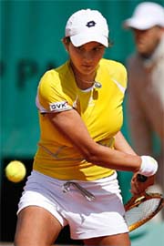 Sania Mirza hits a backhand to Russian Anastasia Myskina during the first round of the French Open in Paris