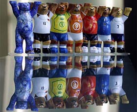 Small Buddy Bears, the mascot of Berlin, are seen painted in the sport jerseys of participant countries of the FIFA 2006 World Cup in a Berlin shop