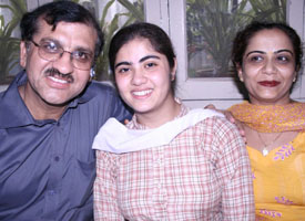 CBSE Class X topper Kirti Ahuja along with her parents. 