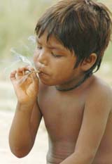 A child takes a drag on World No Tobacco Day in Jalandhar