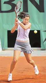 Ana Ivanovic of Serbia & Montenegro plays a shot to Frances Emilie Loit during the second round of the French Open in Paris on Thursday