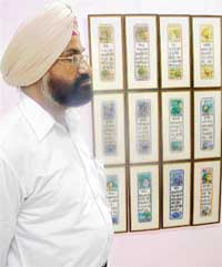SPIRITUAL SCRIPT: J.S. Garcha with his paintings. 