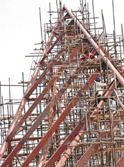 Pakistani construction workers labour busily on a site of a foreign company in Islamabad. Dubai real estate company Emaar Properties signed a memorandum of understanding with Pakistan for a deal worth $18 billion to build a major leisure and commercial development.
