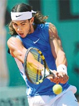 Spains Rafael Nadal in action against Kevin Kim of the US during the French Open in Paris