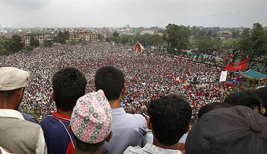 Crowds gather in Ratna Park Open Theatre to listen to Maoist leaders address the gathering in Kathmandu on Friday.