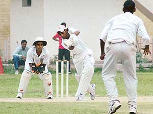 Vikram bats for the Jalandhar side during the under- 19 semifinal tie against the Chandigarh team at DAV School, Sector 8, on Saturday.