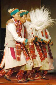 Artistes perform Kinnauri dance on the first day of International Summer Festival in Shimla 