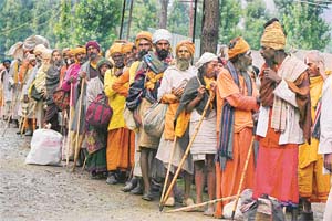 Driven by devotion, the pilgrims smilingly brave the hardships along the route