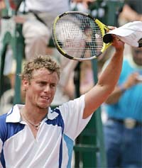 Australias Lleyton Hewitt celebrates after winning his third-round match against Slovakias Dominik Hrbaty during the French Open at Roland Garros in Paris