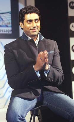 Bollywood actor Abhishek Bachchan smiles after he was declared 'Motostar' for Motorola in Mumbai late on Saturday