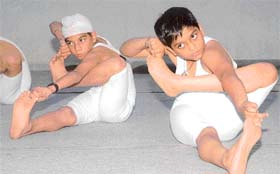 Students of BCM School, Ludhiana, perform yoga asana at a camp in school