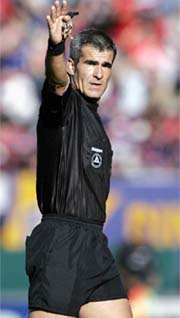 Argentine referee Horacio Elizondo gestures during a football match between San Lorenzo de Almagro and River Plate in Buenos Aires