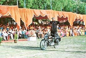Sports teacher Naresh Kumar displays his skills at the sports day in St. Marys Convent at Kasauli. Photo: Madan Mehra