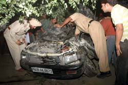 The remains of the car that collided with a truck in the Maqsudan area in Jalandhar