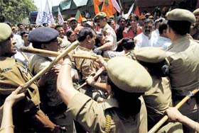 BJP workers clash with the police during a demonstration in Jammu against the killing of Hindus by militants in Doda