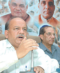 Delhi BJP president Harsh Vardhan and senior party leader Vijay Kumar Malhotra at a party executive committee meeting in the Capital on Saturday. 
